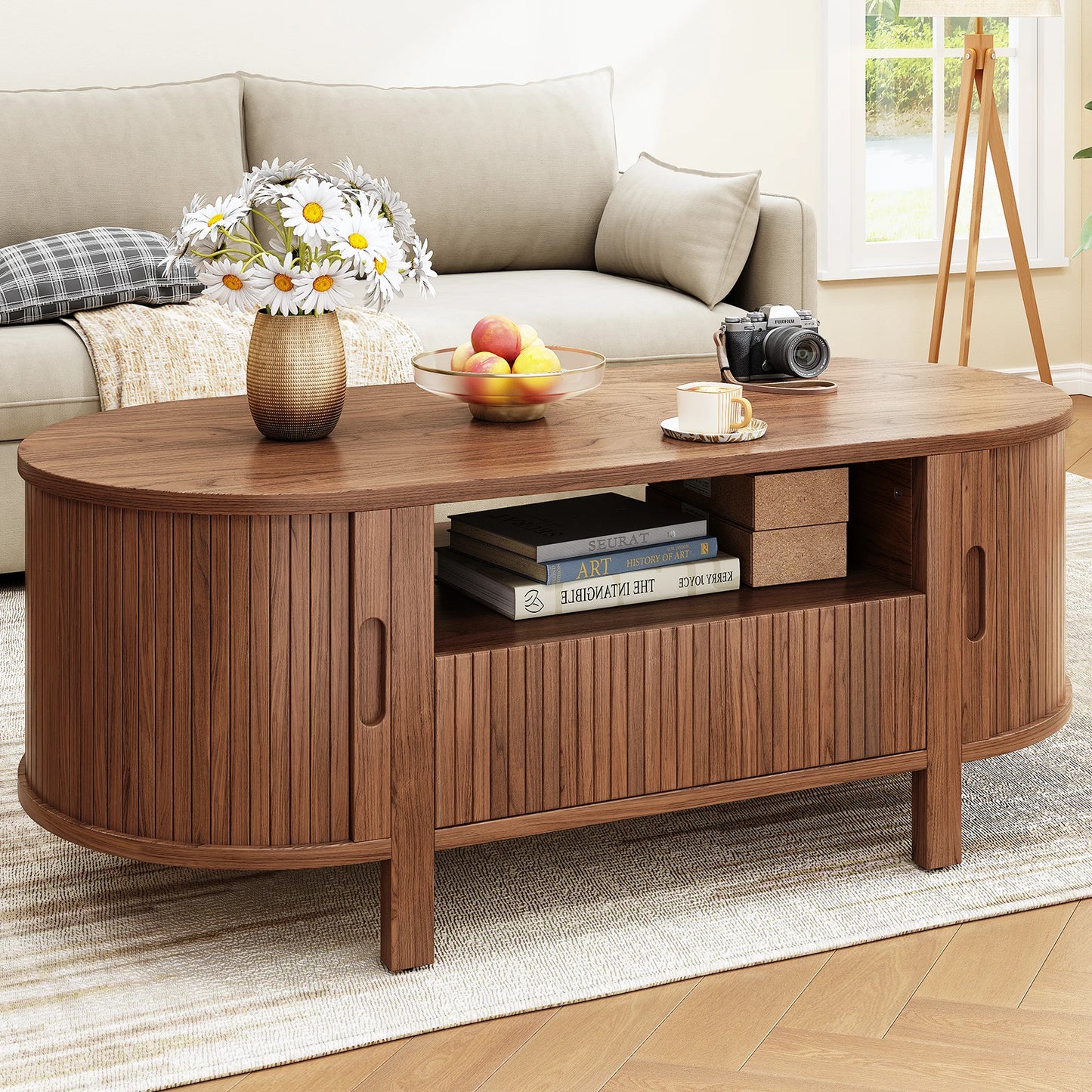 Oval Coffee Table With Storage And Sliding Cabinet Doors