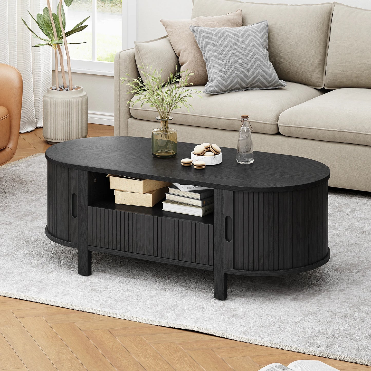 Oval Coffee Table With Storage And Sliding Cabinet Doors