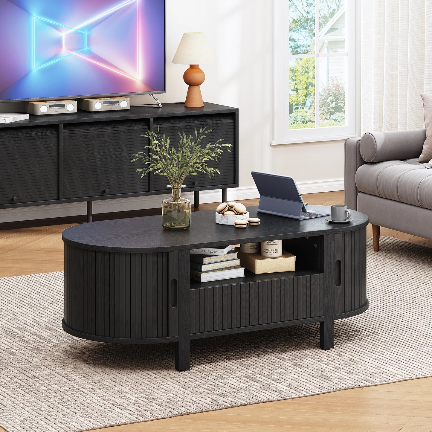 Oval Coffee Table With Storage And Sliding Cabinet Doors